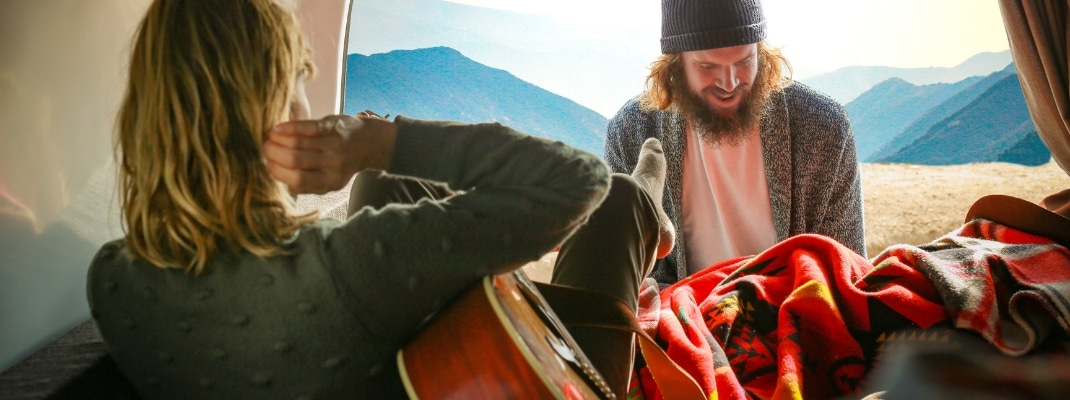 Couple in back of campervan in the USA