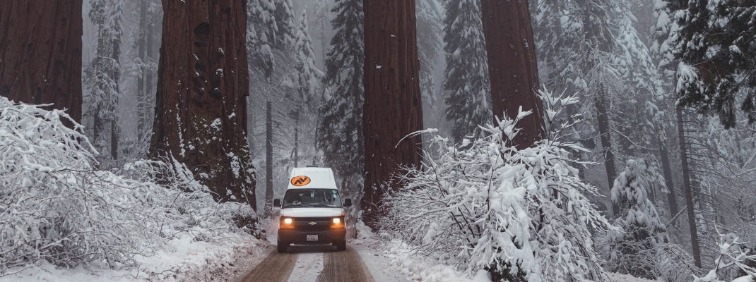 Campervan on road in Sequoia in Winter, USA