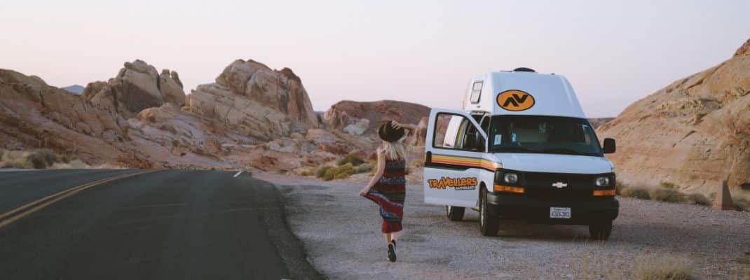 Person walking next to campervan, USA