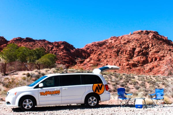 Minivan with chairs and a cooler