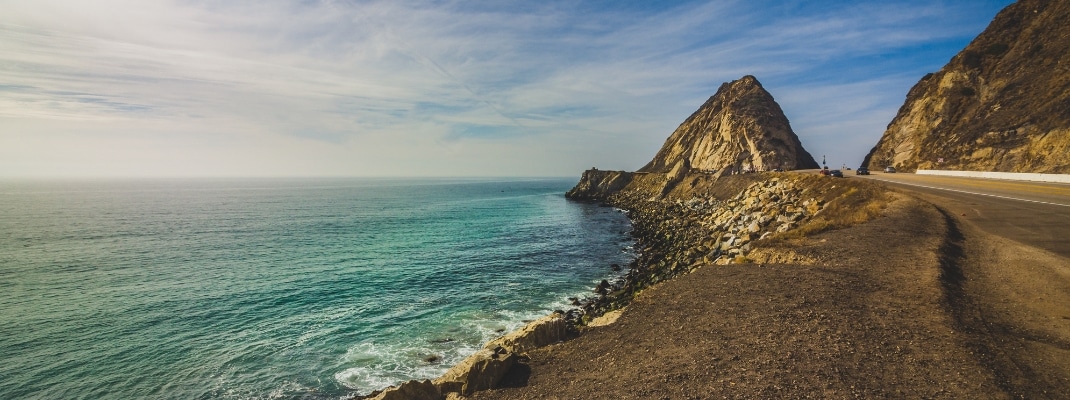 Rocky shoreline view of the Point Mugu Rock along Pacific Coast Highway, Point Mugu, California 