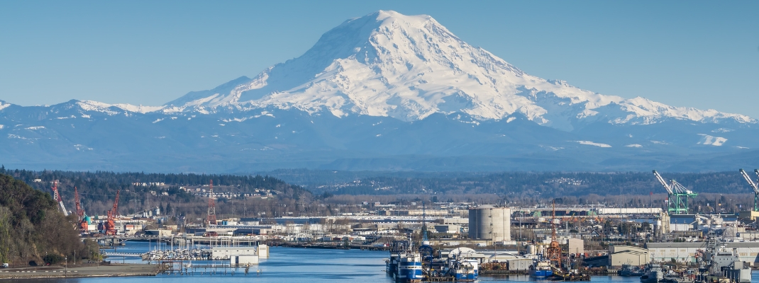 A view of the Port of Tacoma and Mount Rainier.
