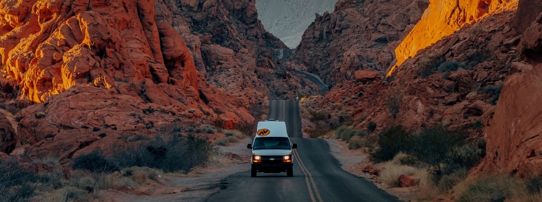 Campervan driving through Valley of State Fire