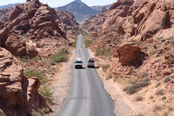 Two campervans passing Valley of Fire