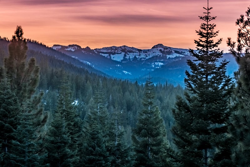 Sunset over snowy mountains at Squaw Valley
