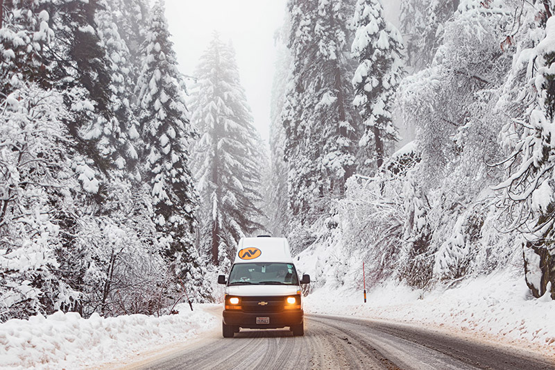 Travellers Autobarn Campervan driving through snow