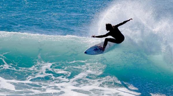 male surfing in Malibu