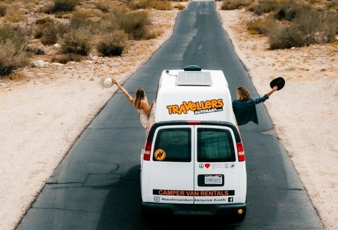 Sydney and Davis on the road in travel van