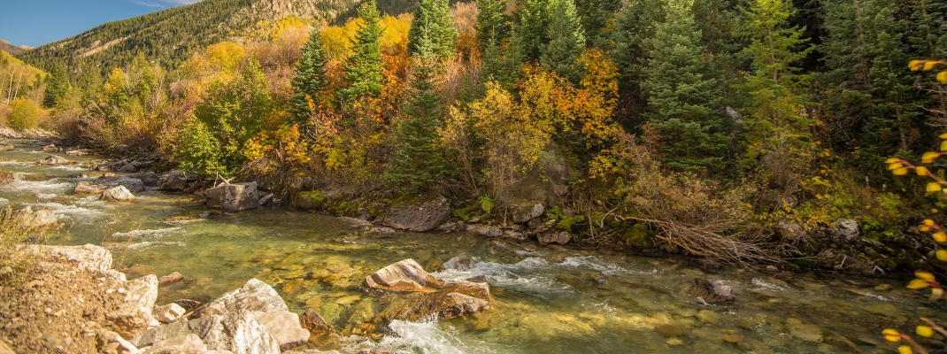 Crystal river on a bright sunny autumn day in Colorado 