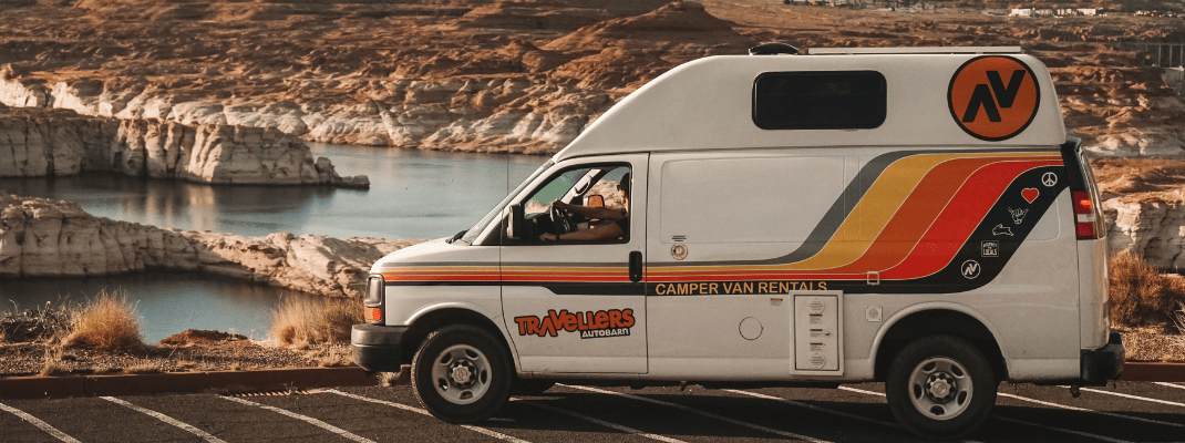 Campervan parked next to lake, USA