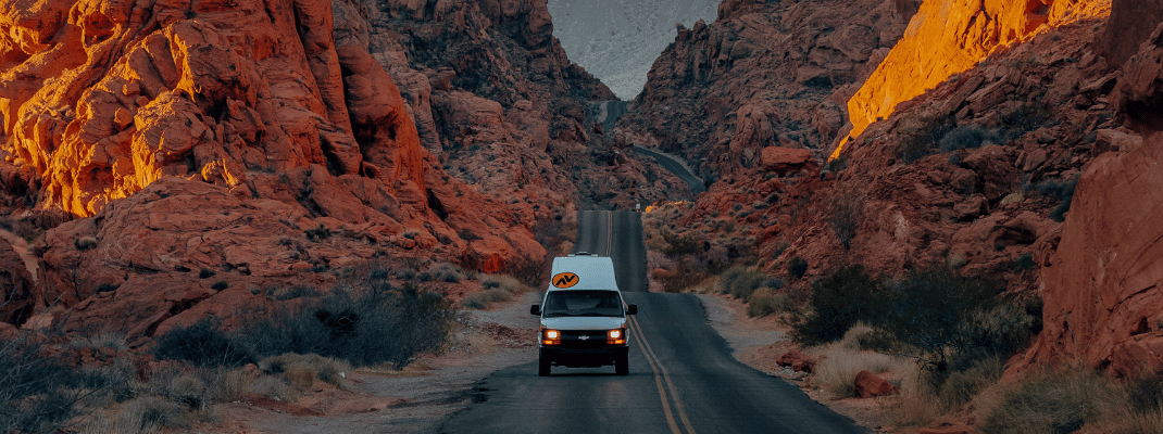 Campervan on road in Valley of Fire, USA