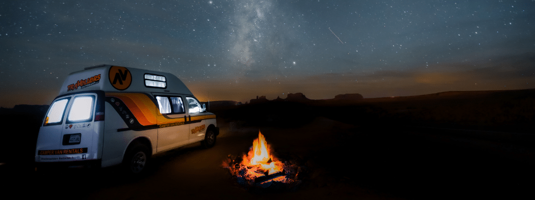 Stargazing next to a campfire in the USA