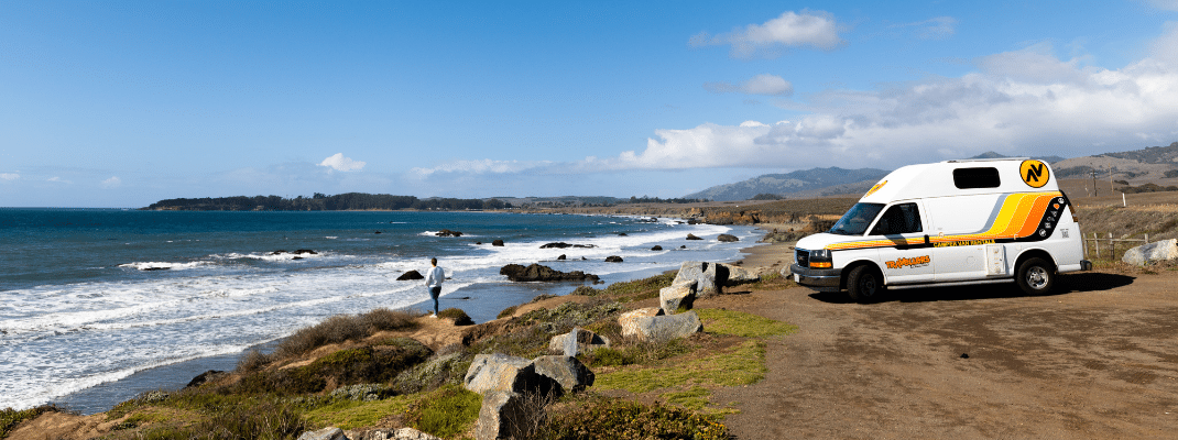 Campervan next to beach on West Coast USA