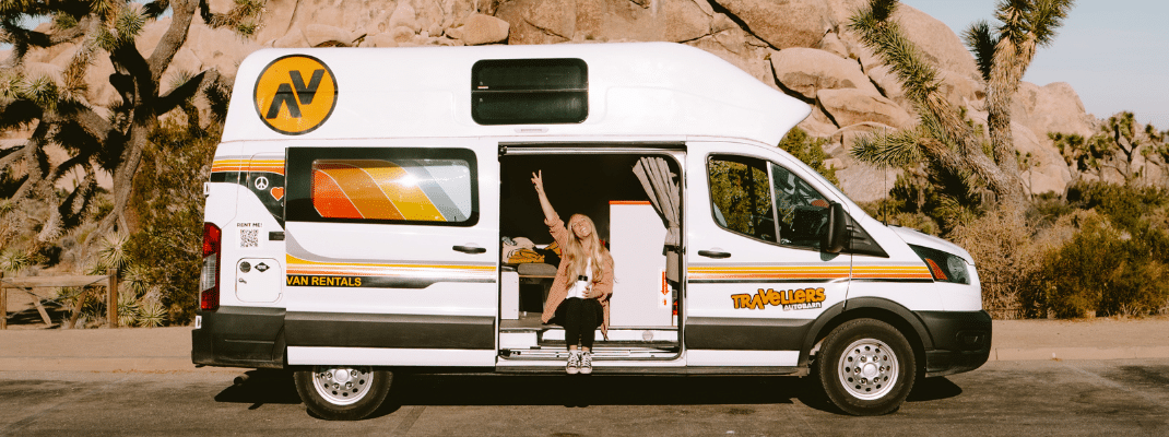 Person sitting in campervan in Joshua Tree National Park, USA
