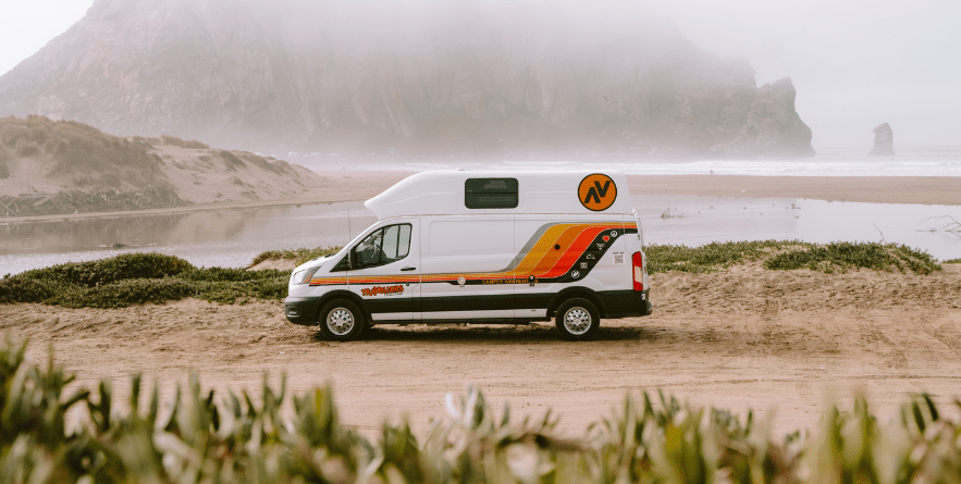 Campervan parked with view of Morro Bay, USA