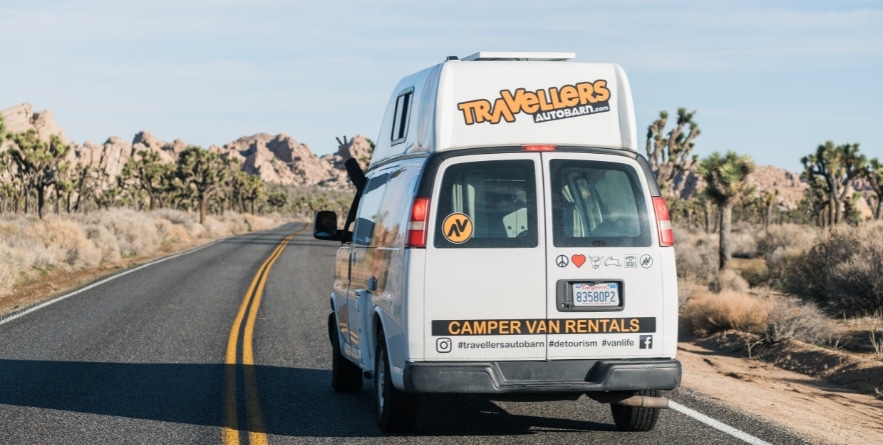 Campervan on road in Joshua Tree National Park, USA
