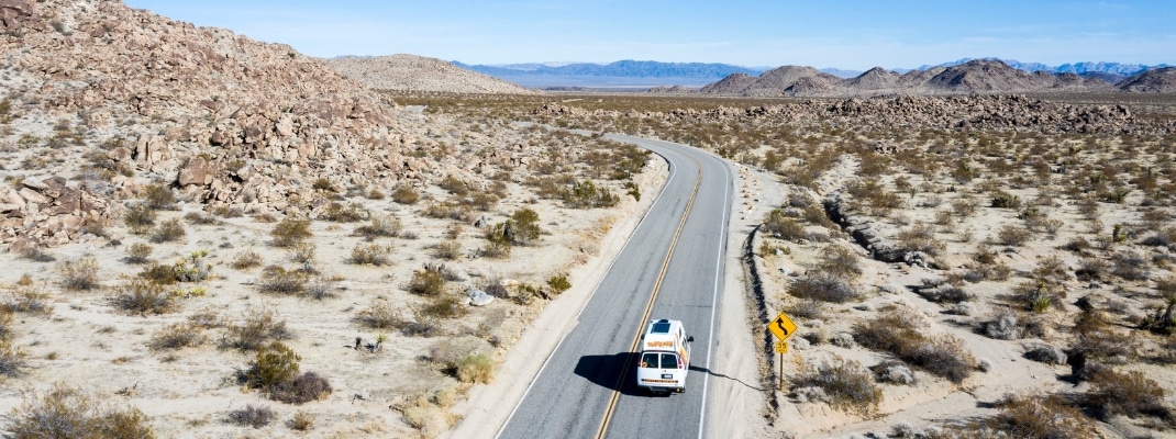 Campervan driving through desert in the USA