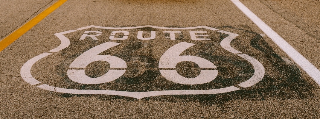 Sign of Route 66 on road in the USA