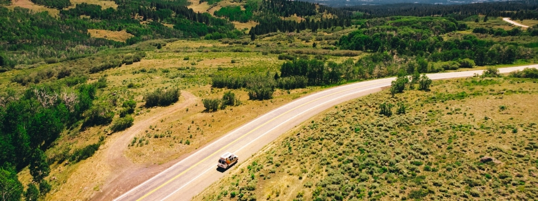 Campervan driving along road in the USA