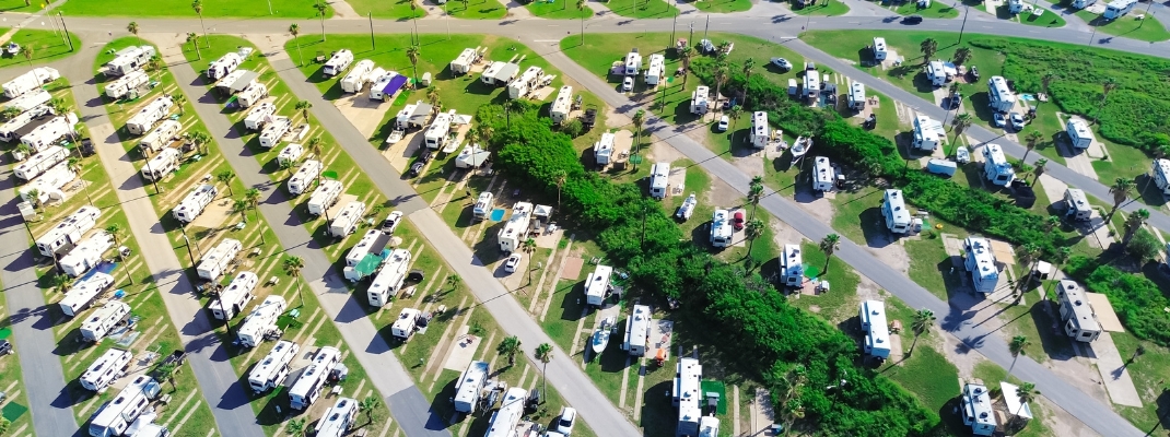 Large RV park campsite long row of recreational vehicles