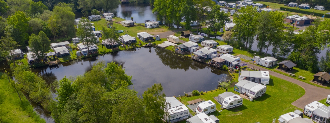 aerial drone view of caravan motor home camp site