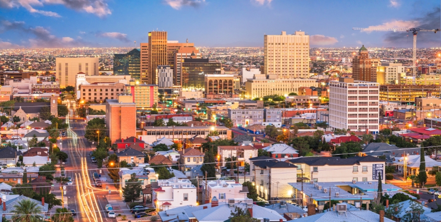 El Paso, Texas, USA downtown city skyline at dusk with Juarez, Mexico in the distance.