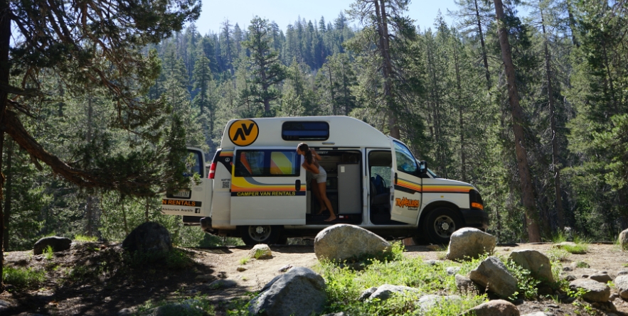 Campervan parked in forest, Yosemite National Park