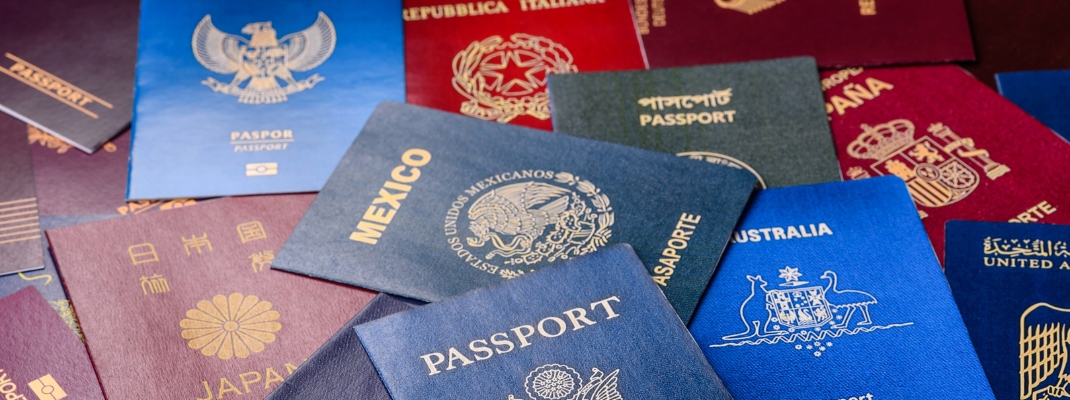 Passports of citizens of different countries of the world, background consisting of passports of several countries. (1)