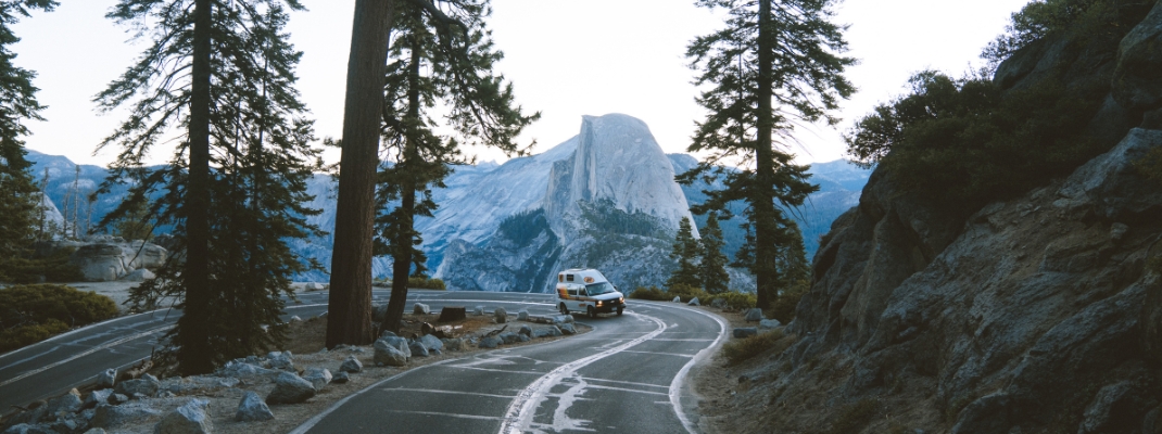 Campervan driving on road in Yosemite National Park