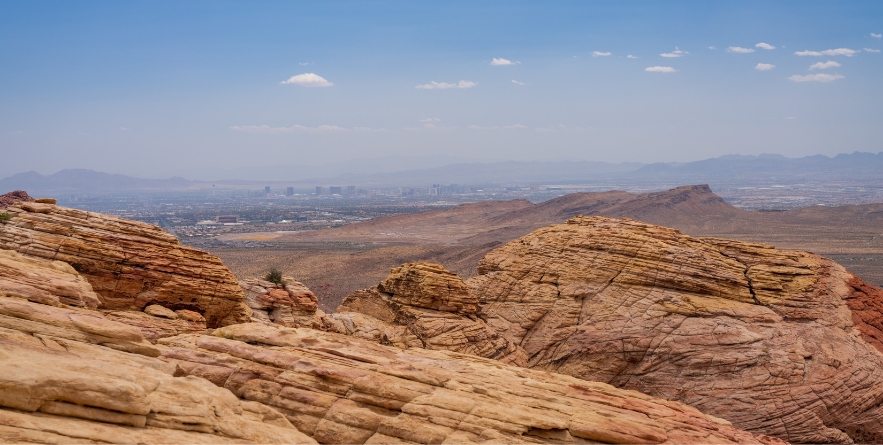 View over the Las Vegas valley from overlook on the moderate Calico Tanks trail in the Red Rock Canyon in Nevada