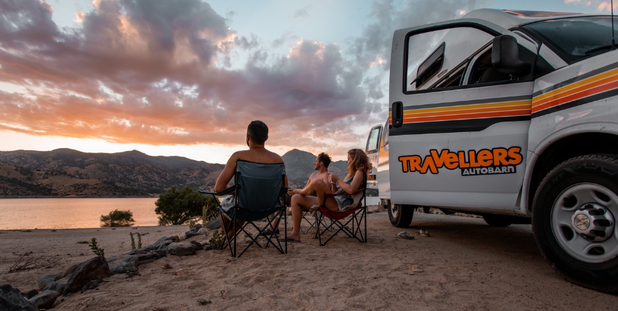 People watching sunset at camping spot
